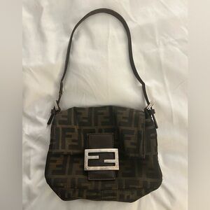 Good condition with the exception of the strap on the right.